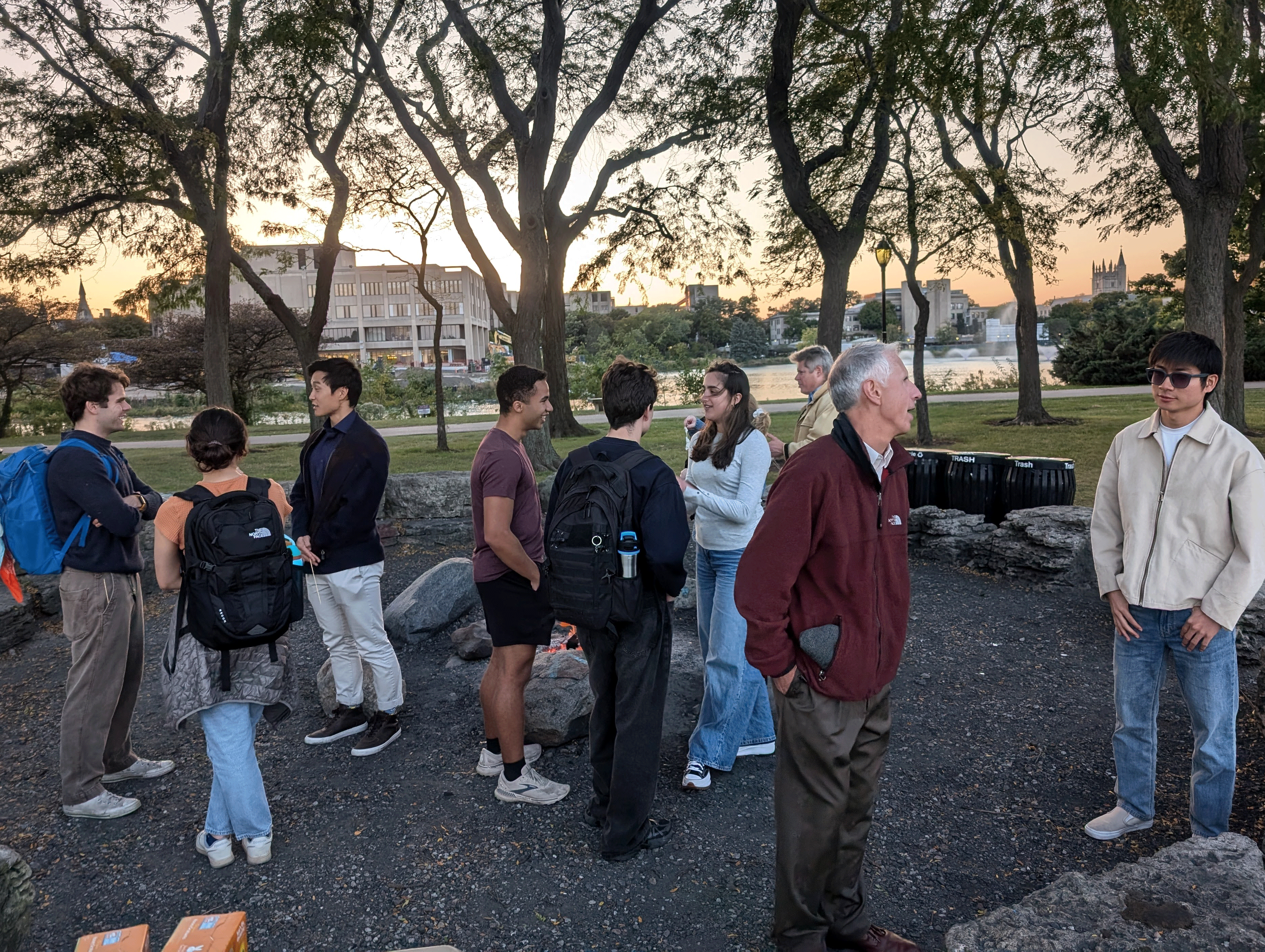 Students and faculty at a bonfire