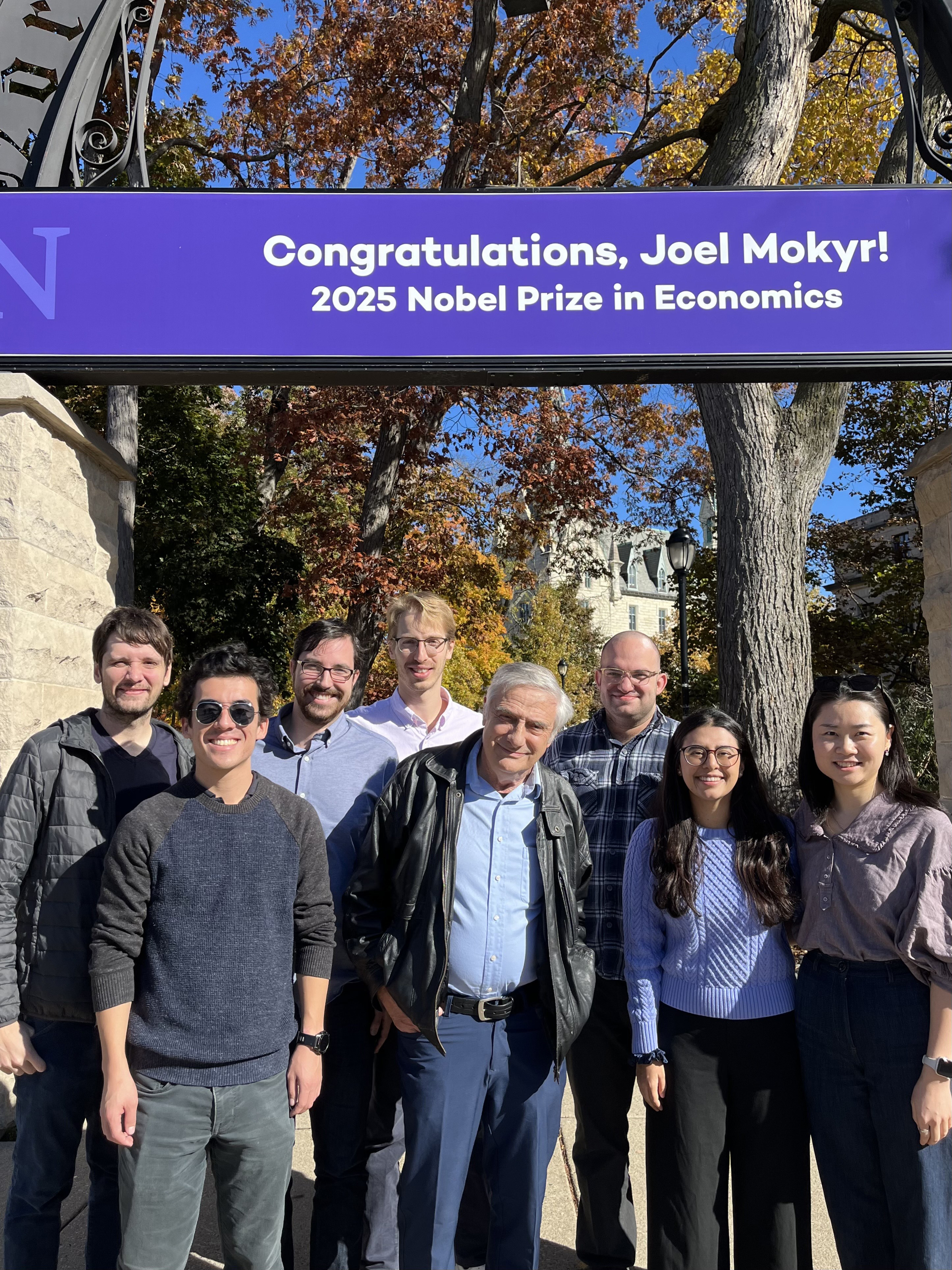 Joel Mokyr and students under the Weber Arch
